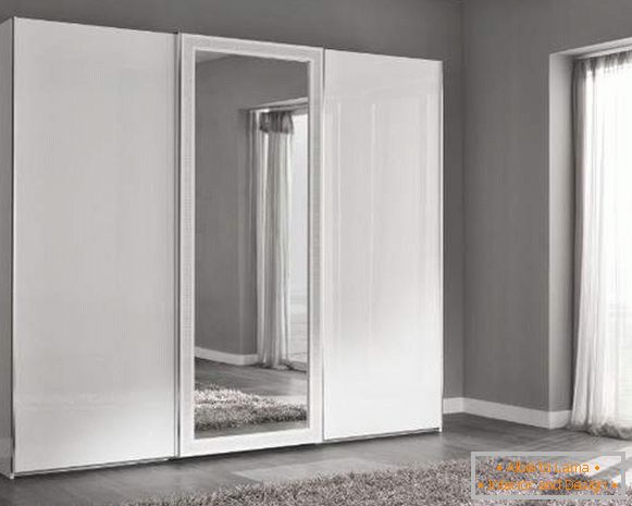 The ideas of the wardrobe in the bedroom in white with a mirror