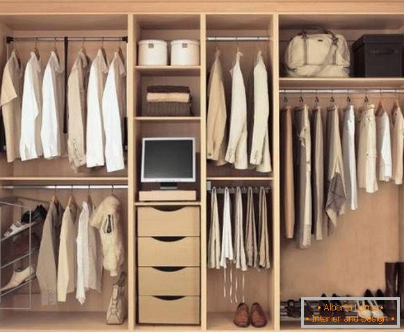 Internal filling of the wardrobe in the bedroom - фото с телевизором
