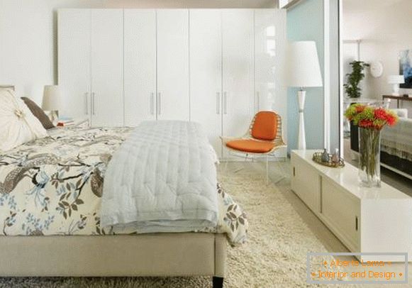 Modern wardrobe in the bedroom in white color