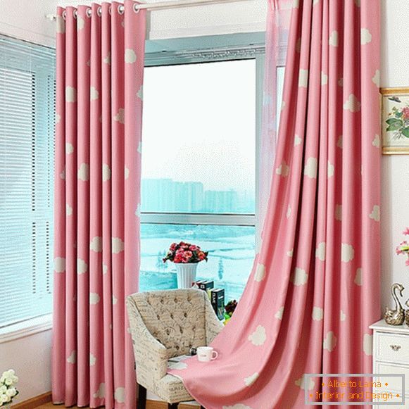 Pink curtains on the eyelets in the bedroom