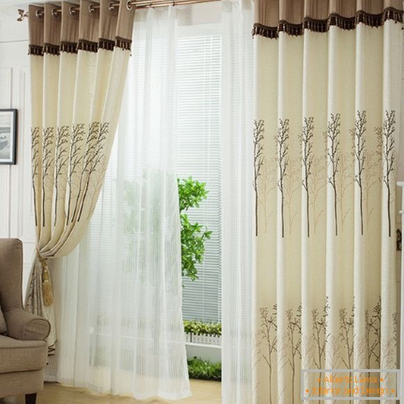 Curtains and tulle on the eyelets in the modern interior