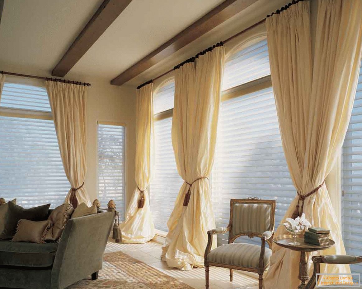 adorable-living-room-curtains-sets-with-drop-ceiling-design-and-brown-sheer-curtains-also-sofa-bed-on-carpet-and-two-armchair-with-wooden-small-table