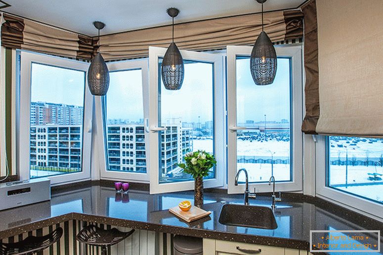 Modern kitchen connected to a balcony