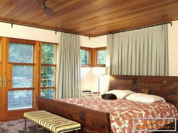Green curtains in the bedroom - photos news 2016