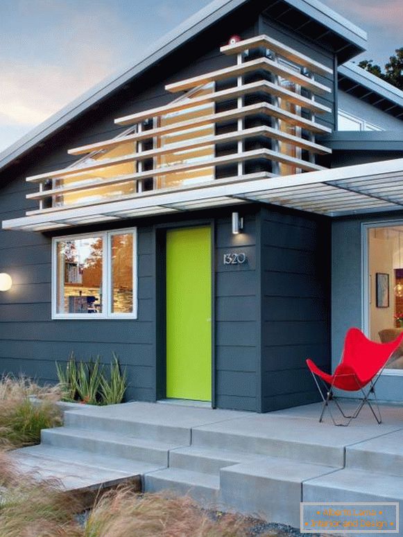 Bright metal doors at the entrance to the house