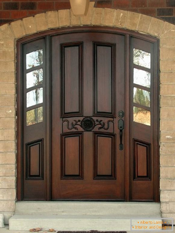 Brick house with wooden entrance doors