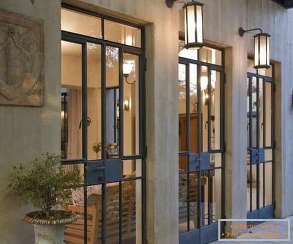 Glass entrance doors in metal casing