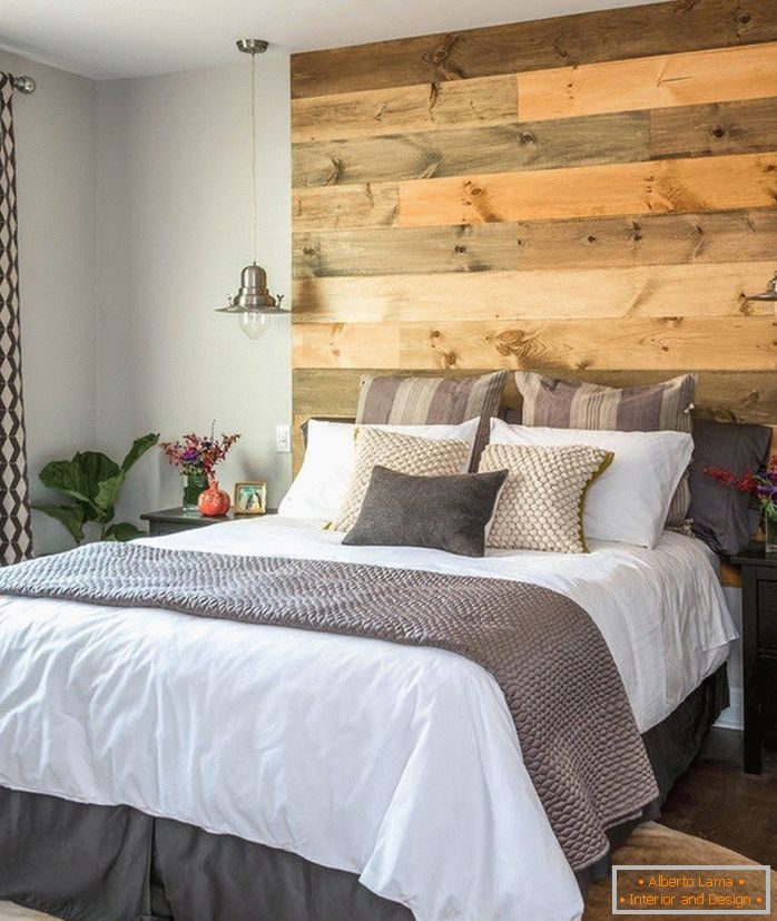 Wooden headboard above the bed
