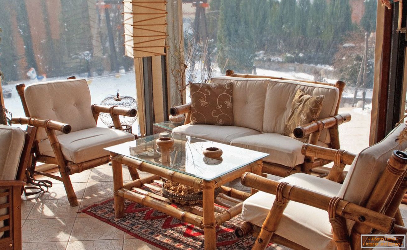 Glass coffee table on the loggia