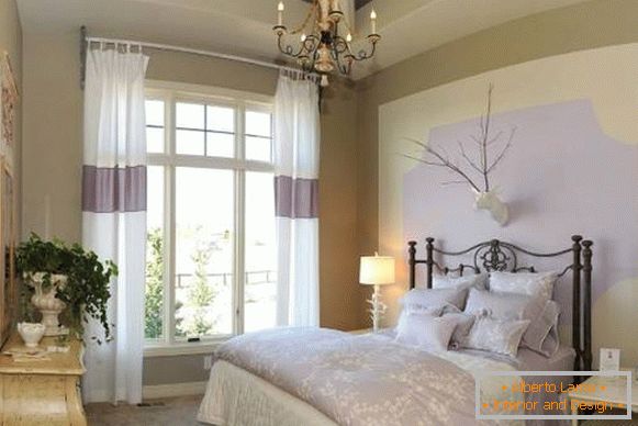 Light curtains in the bedroom in the style of Provence in white and lilac color