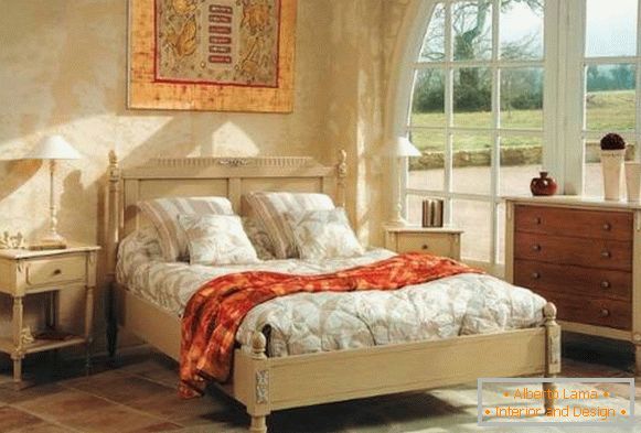 Bed in the style of Provence and other furniture in the interior