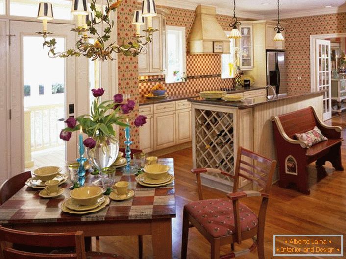 Country style is ideal if it comes to decorating kitchen space. A small kitchen in a country house in the country style is an excellent place for warm family gatherings.