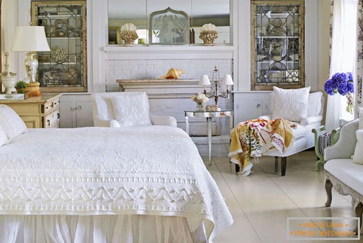 White bedroom in country style in a house in the north of Moscow region.