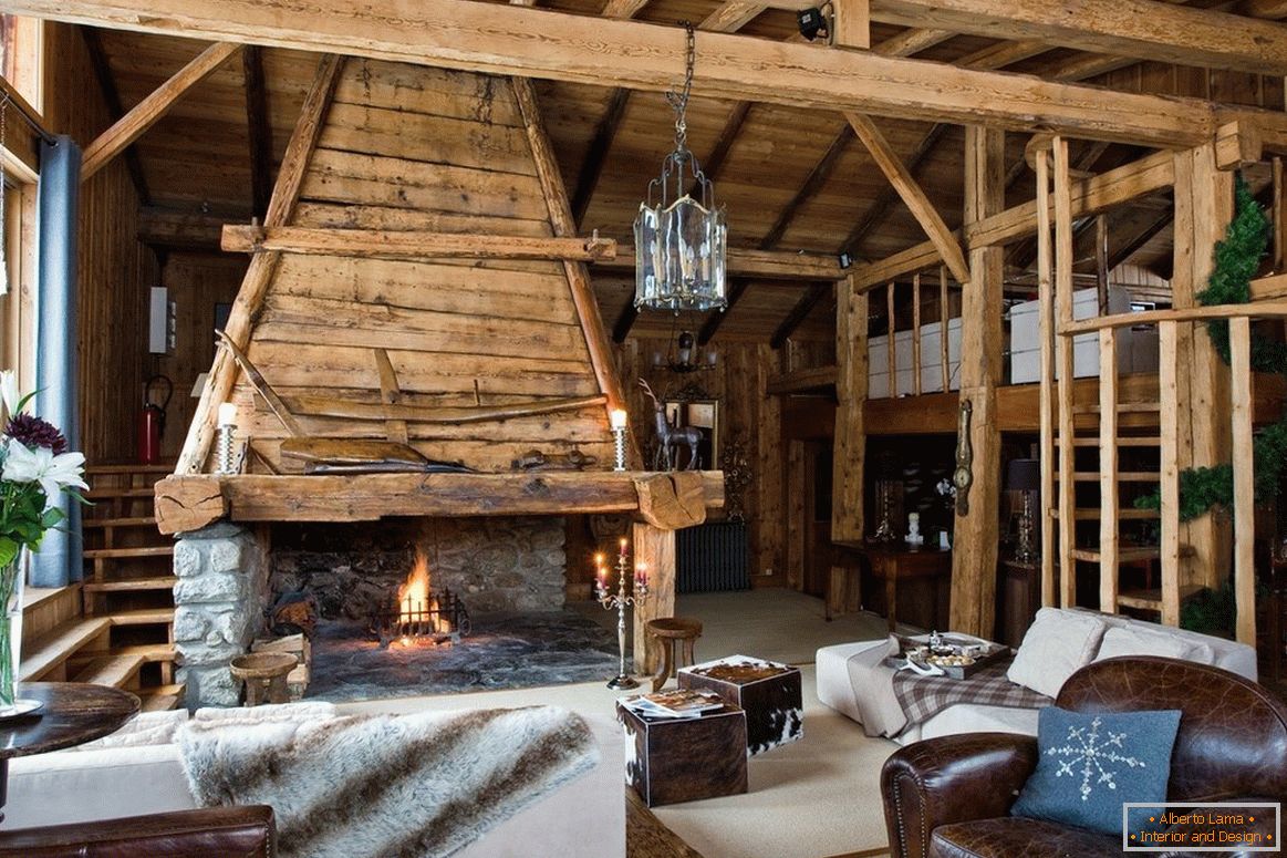 A room made of wood with a fireplace
