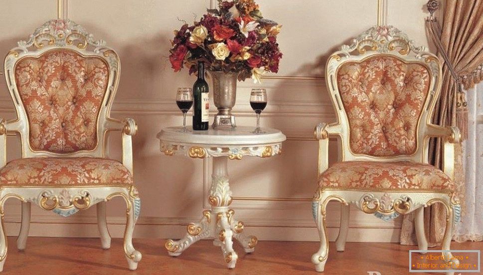 Wine on the table and chic chairs