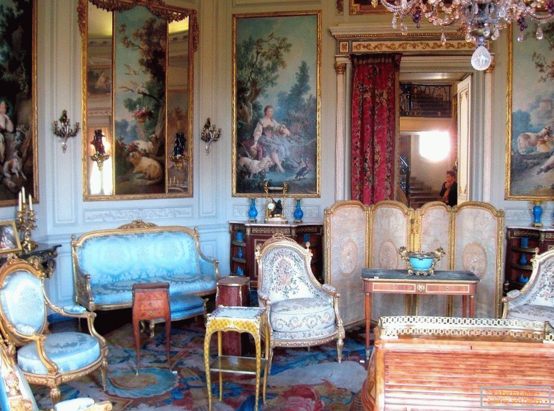 Hall with paintings and chic furniture