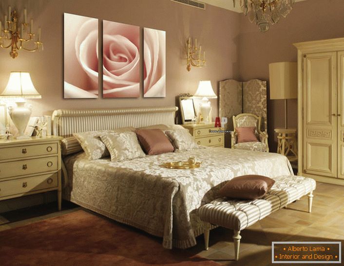 The bud of a pale pink rose on modular paintings complements the luxurious interior of the bedroom in the Art Deco style.