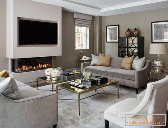 TV above the fireplace in the chic modern living room