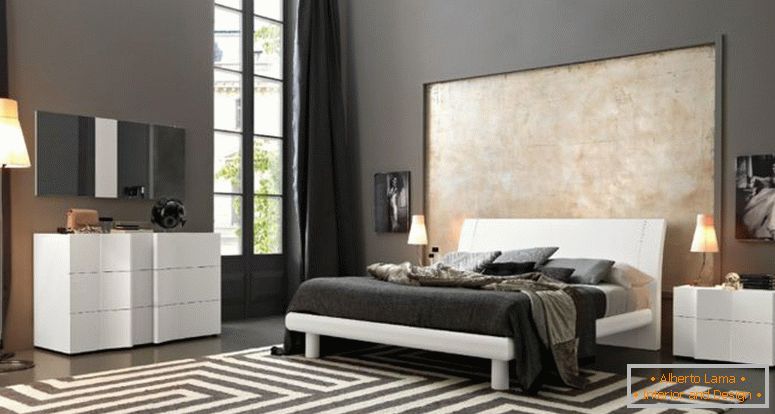 blue-carpet-on-the-wooden-floor_grey-end-of-bed_floral-black-blanket_dark-gray-master-bedroom_wooden-platform-bed