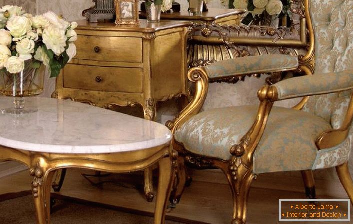 Wooden furniture with dark gold-plated in the Baroque style. An excellent solution for the living room in the house of a young lady.