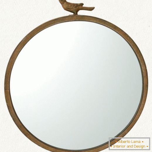 Round mirror in wooden frame