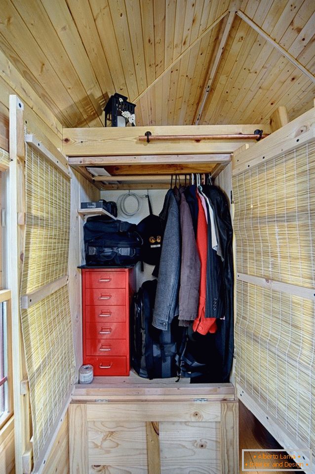 Wardrobe of a small wooden cottage