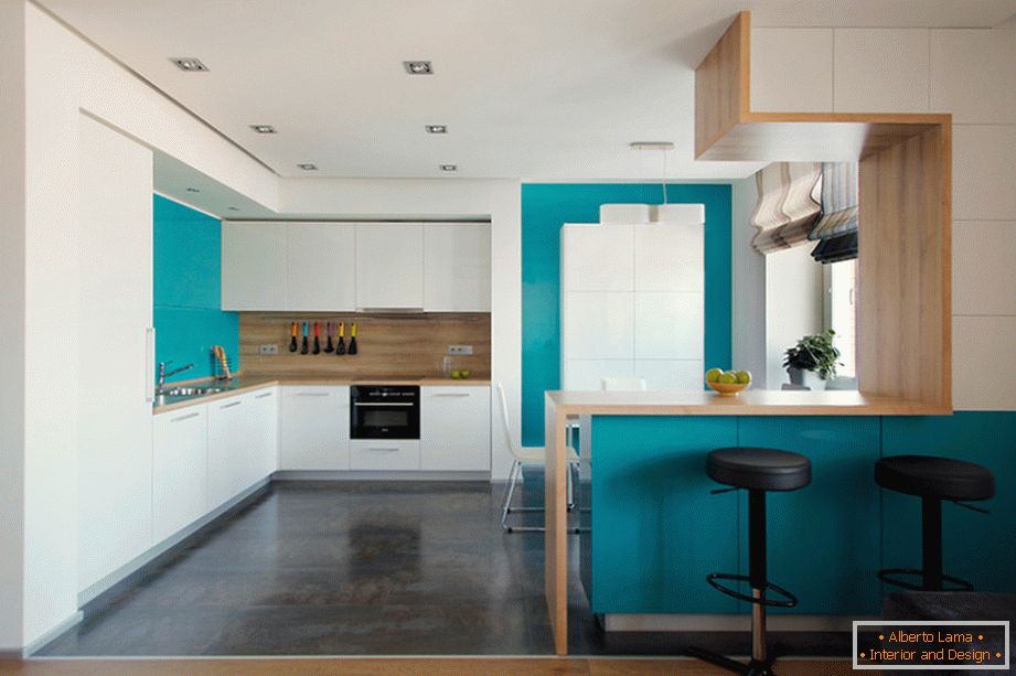 White kitchen with turquoise tiles and wooden wall decoration