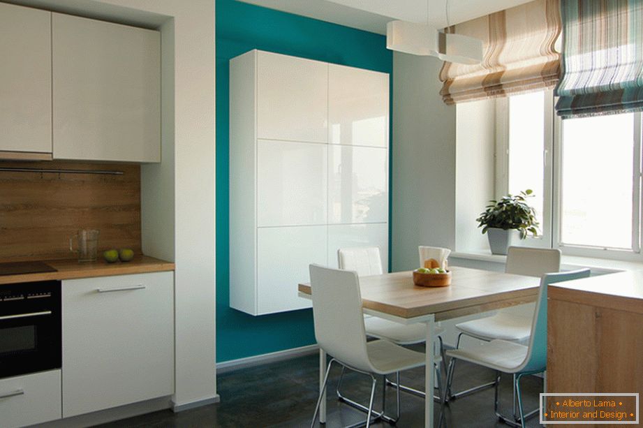 Original design of the kitchen and dining room in turquoise-white colors with elements of wood