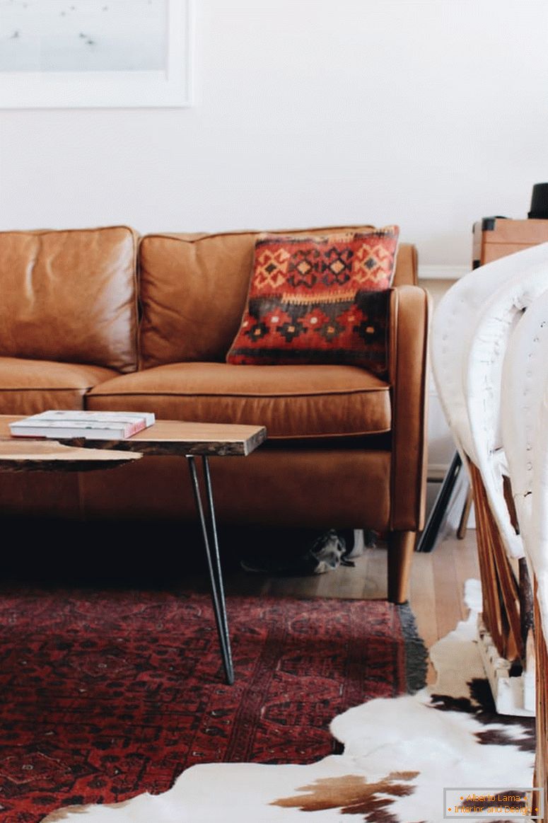 Leather sofa in the interior of the living room