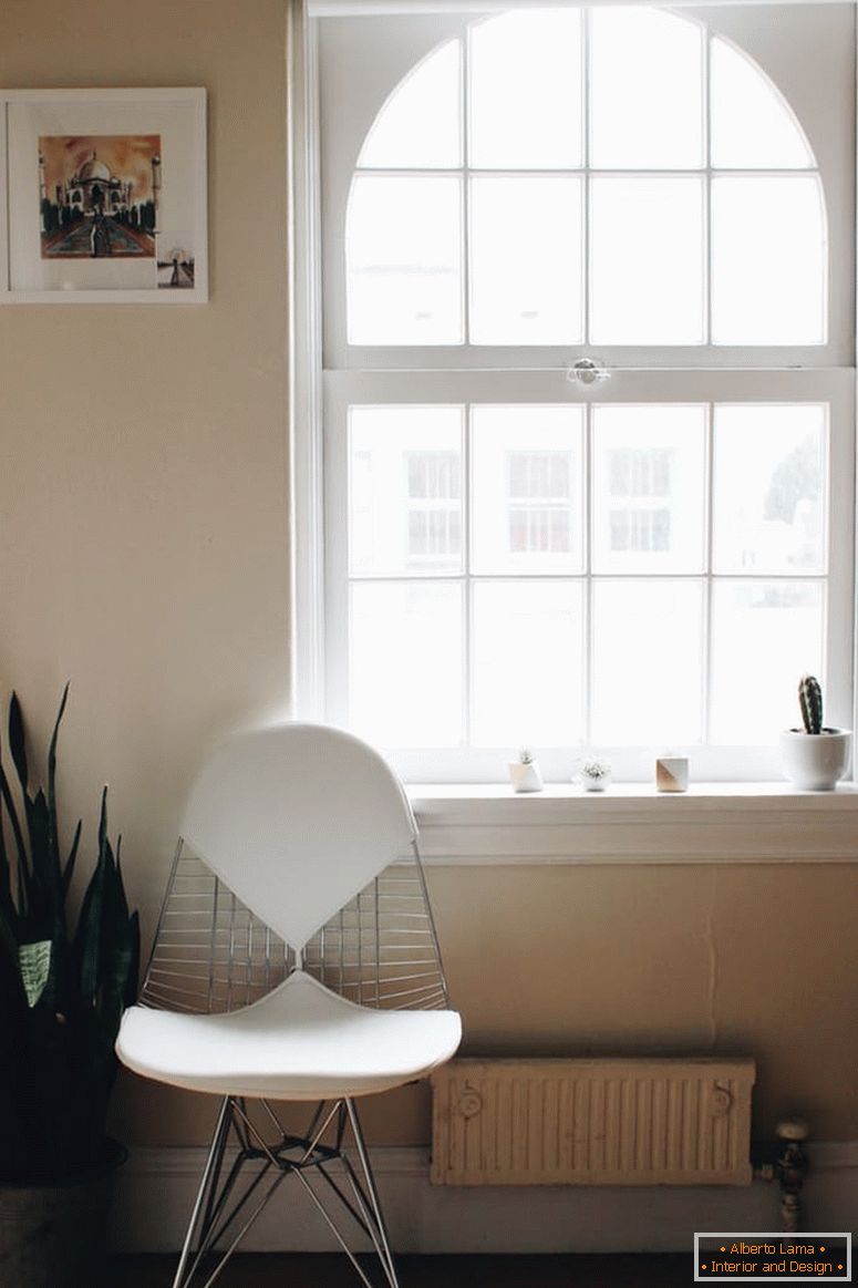 White chair by the big window