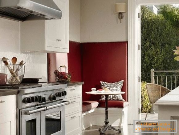 Dining area in the kitchen - design in red and white tones