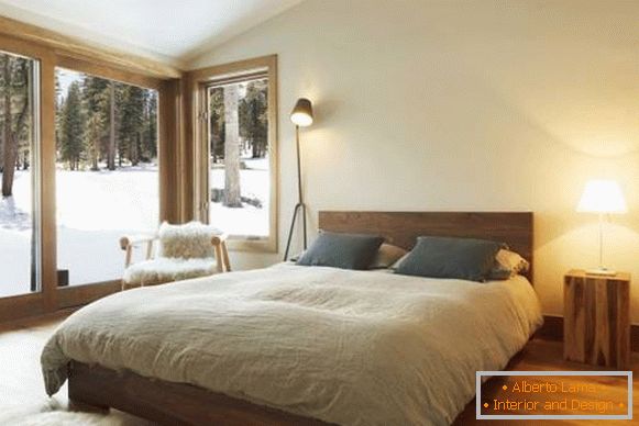 cozy-bedroom-with-large-windows-in-the-woods