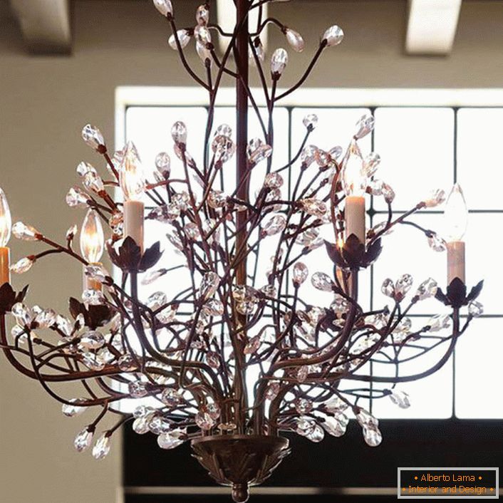 A correct example of a chandelier imitating a tree branch, for a room in a country style. 