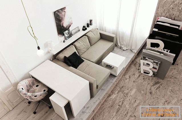 Living room of a two-storey studio apartment in Poland