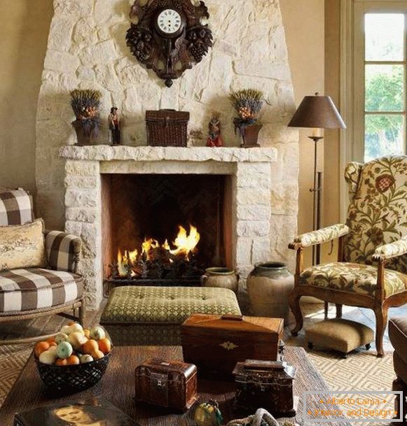 Design of the living room with different armchairs near the fireplace