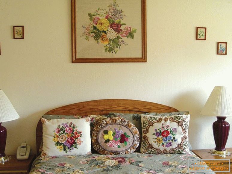 Lamps on bedside tables near the bed