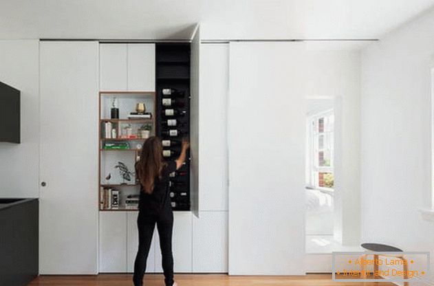 Modular wall in the interior of the apartment: functional boxes