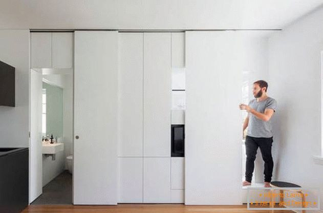 Modular wall in the bright interior of the apartment