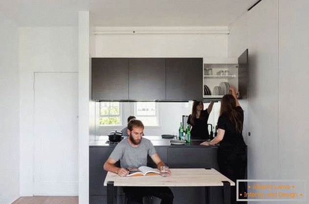 Modular wall in the interior of the apartment with a mirror finish