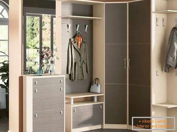 Corner wardrobe compartment in the hallway gray with cream