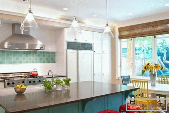 Bright combination of shades in the interior of the blue kitchen