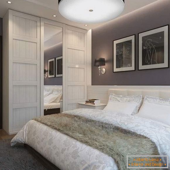Built-in wardrobe compartment in the bedroom in a modern style with a mirror and lighting
