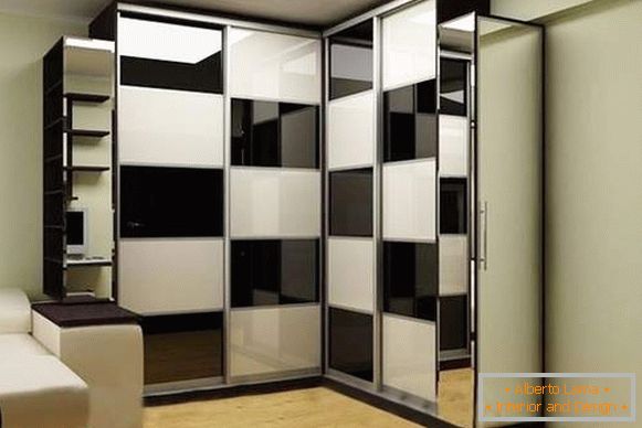 Corner built-in wardrobes in the compartment in the living room black and white