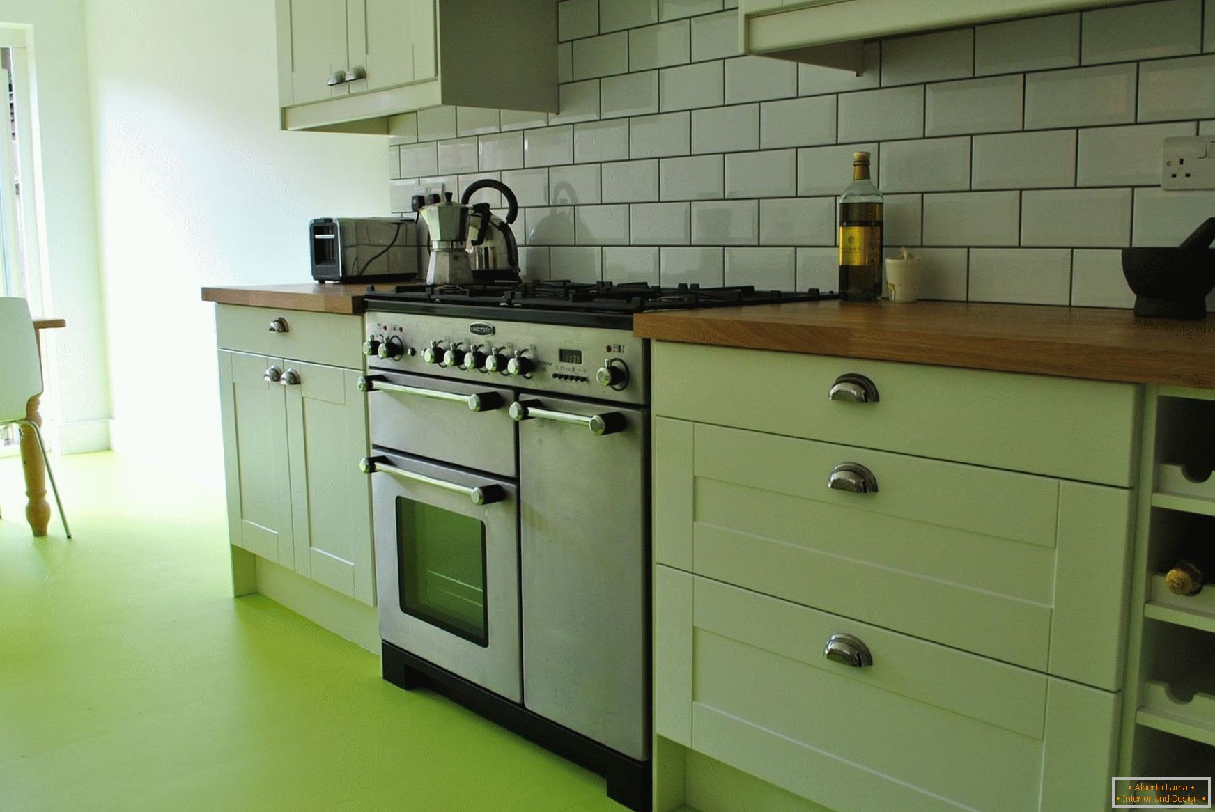 Green kitchen in the interior