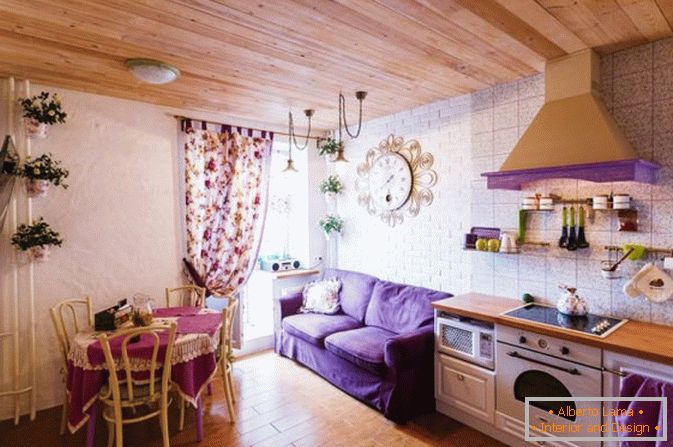 Purple accents in the interior of studio apartments