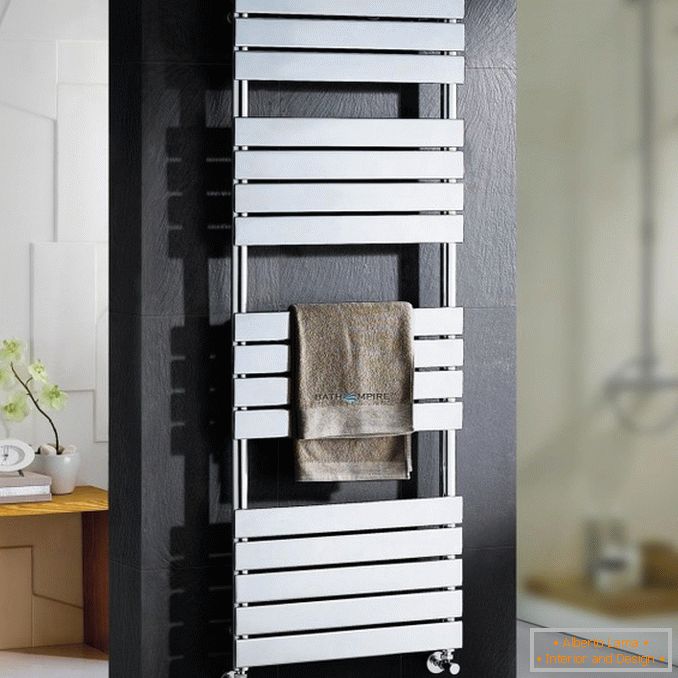 Wall-mounted radiator with a towel rail