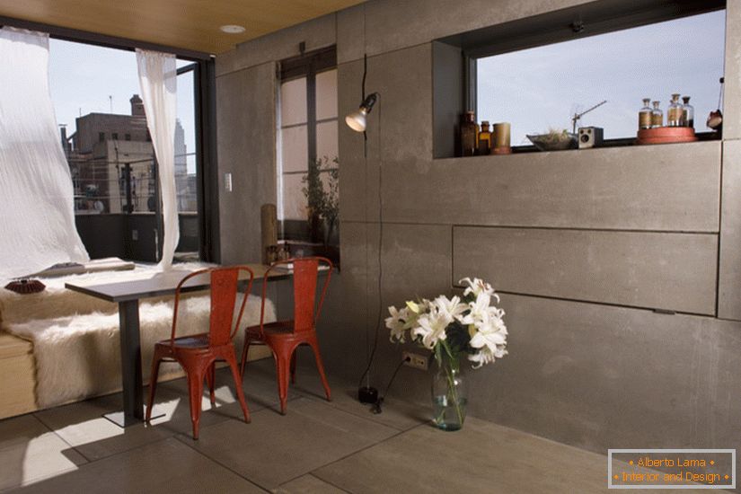 Sofa with dining table in the bedroom