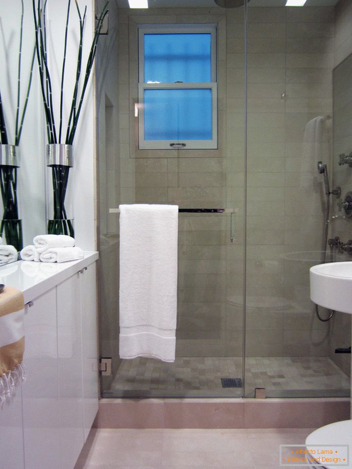 Towel rail on the shower door