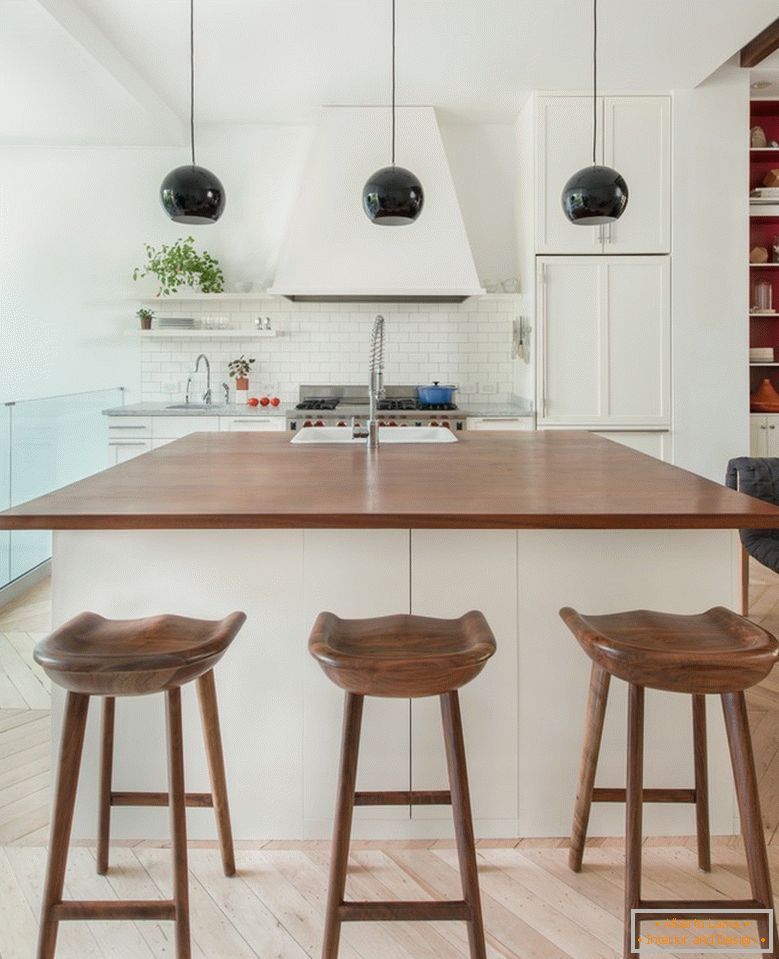 Stylish white kitchen with bar stools