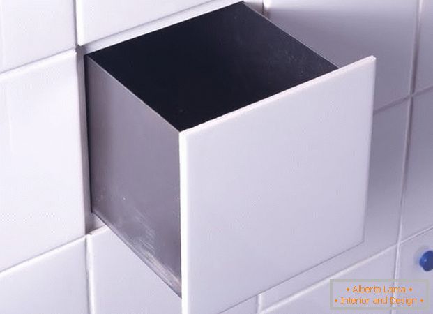 Drawer behind the tiles